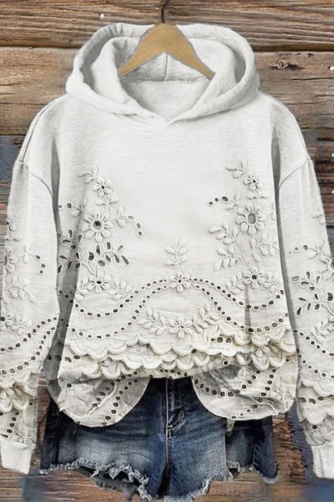 BLUSA ESTAMPADA CON CAPUCHA