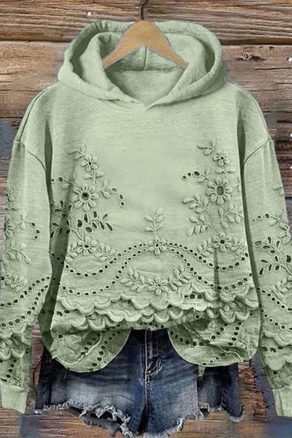 BLUSA ESTAMPADA CON CAPUCHA