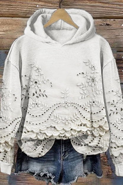BLUSA ESTAMPADA CON CAPUCHA
