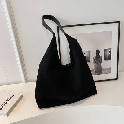 Bolso de ante con asa