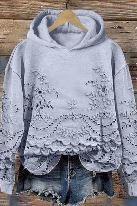 BLUSA ESTAMPADA CON CAPUCHA